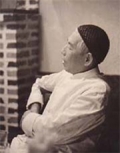 (初代) 間 載一
